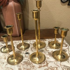 Brass candle stick holders set of 7